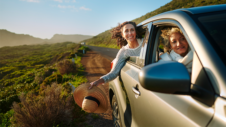 two women in a car on vacation